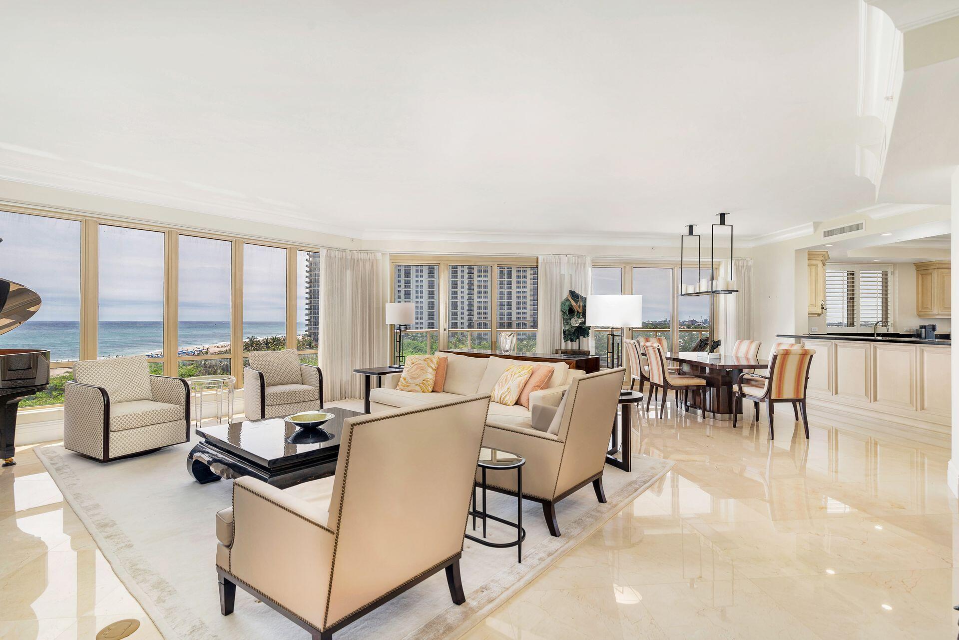 3920 North Ocean Drive, Unit 7A Singer Island, FL 33404 - Photo 4 of 35 a living room with furniture and large windows