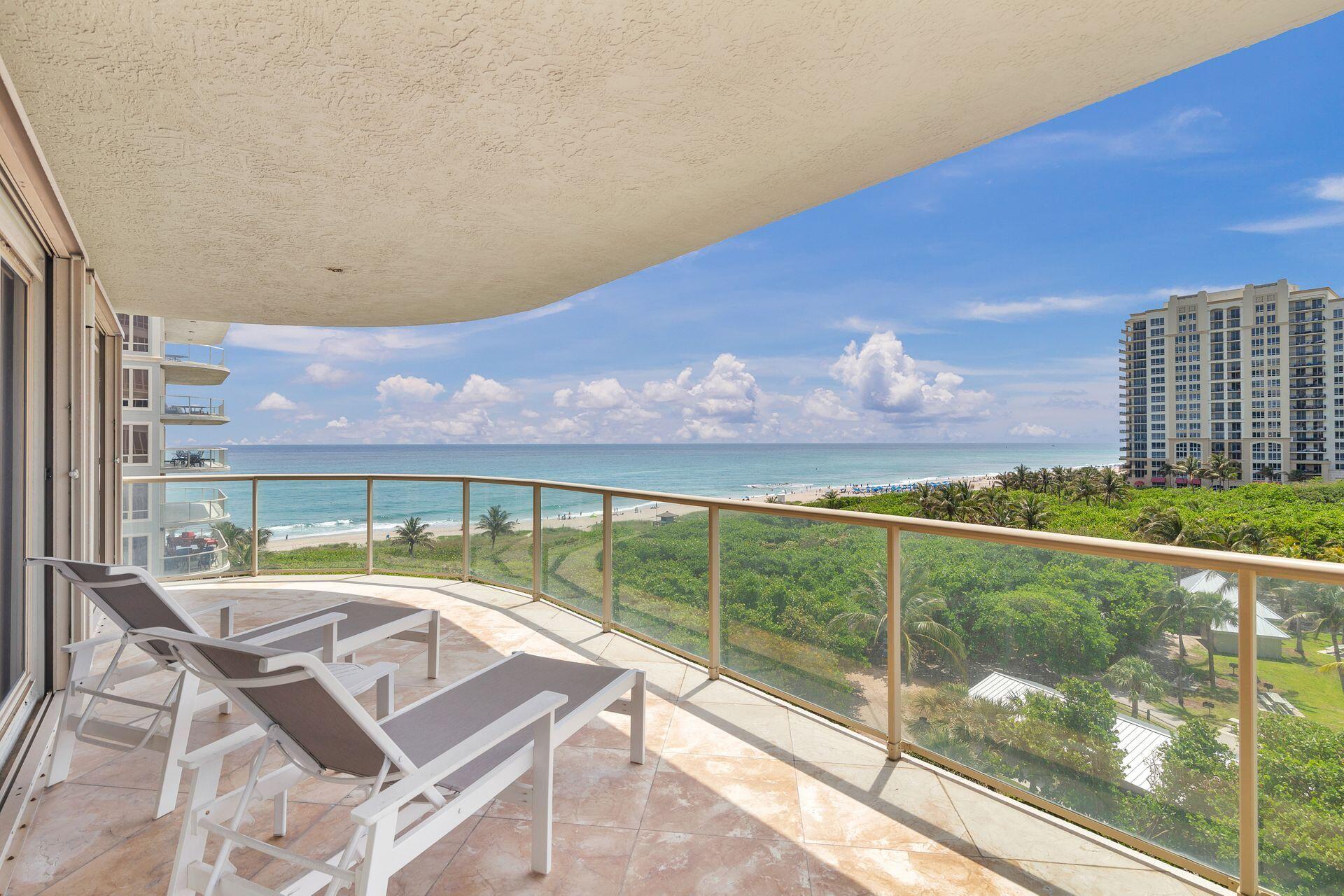 3920 North Ocean Drive, Unit 7A Singer Island, FL 33404 - Photo 7 of 35 a view of a balcony with lake view and a ocean view