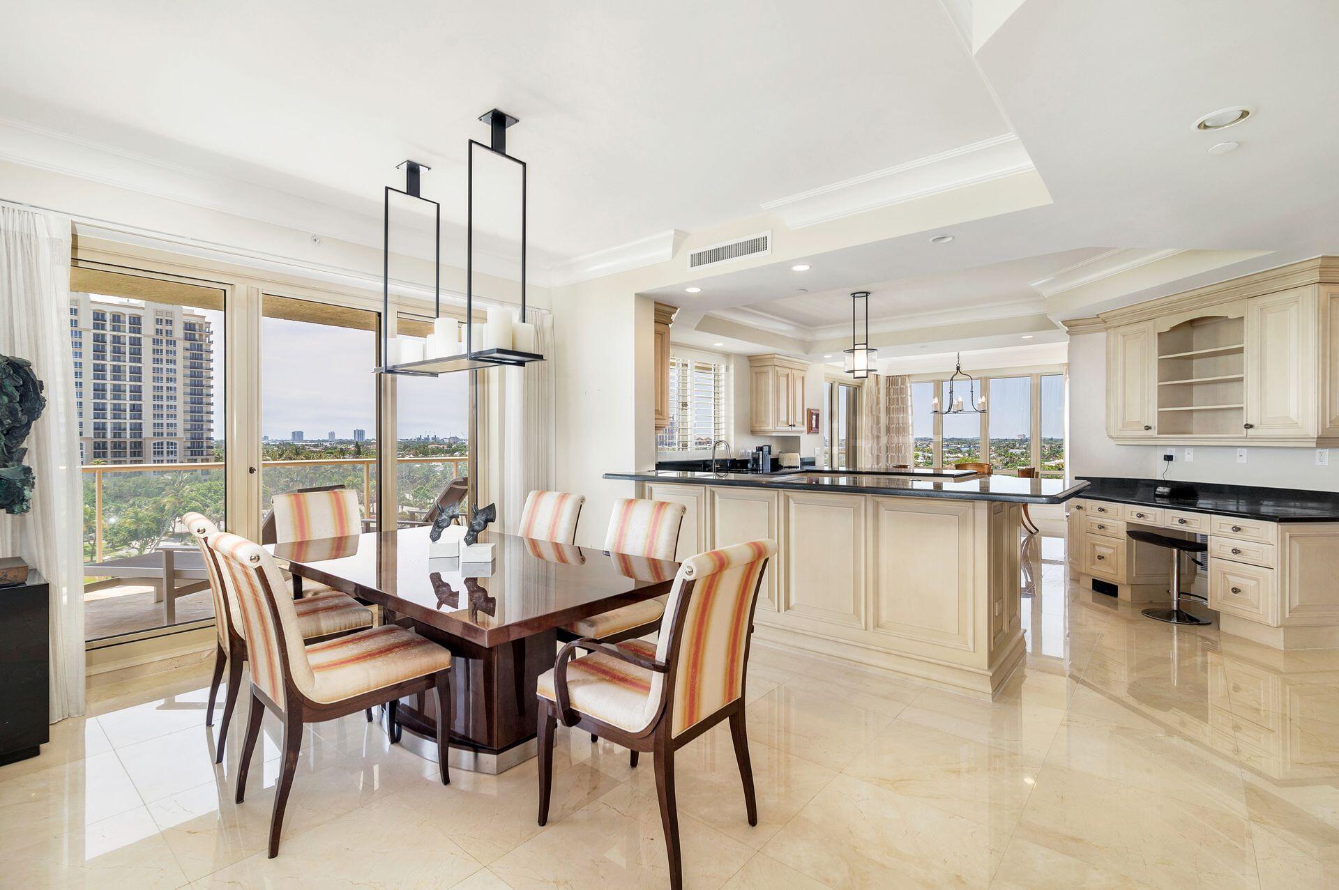 3920 North Ocean Drive, Unit 7A Singer Island, FL 33404 - Photo 10 of 35 a dining room with furniture and wooden floor
