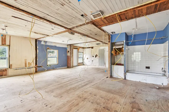 an empty room with windows