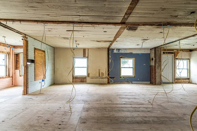 a bathroom with a tub and a shower