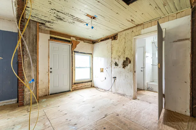 an empty room with windows