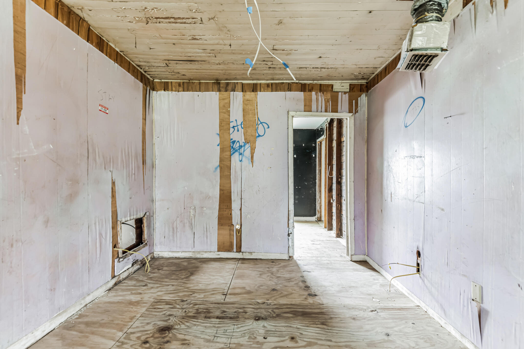 2511 Lipscomb Street Melbourne, FL 32901 - Photo 30 of 30 a view of a hallway with wooden walls