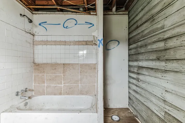 a bathroom with a bathtub