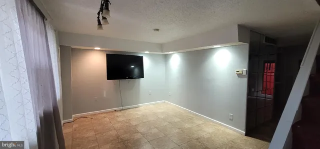 a view of entryway with stairs