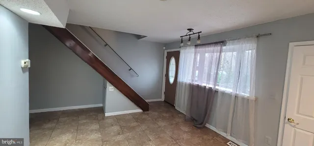 a bathroom with a sink a vanity and a mirror