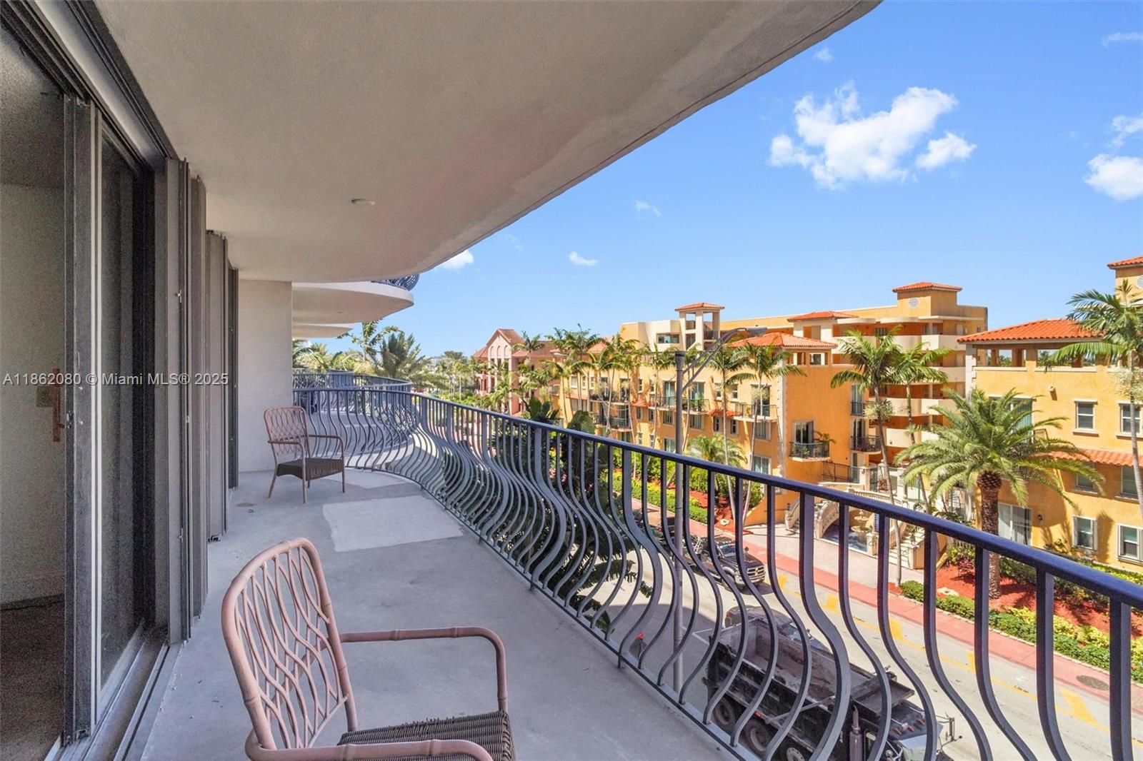8877 Collins Avenue, Unit 405 Surfside, FL 33154 - Photo 20 of 21 a view of balcony with furniture