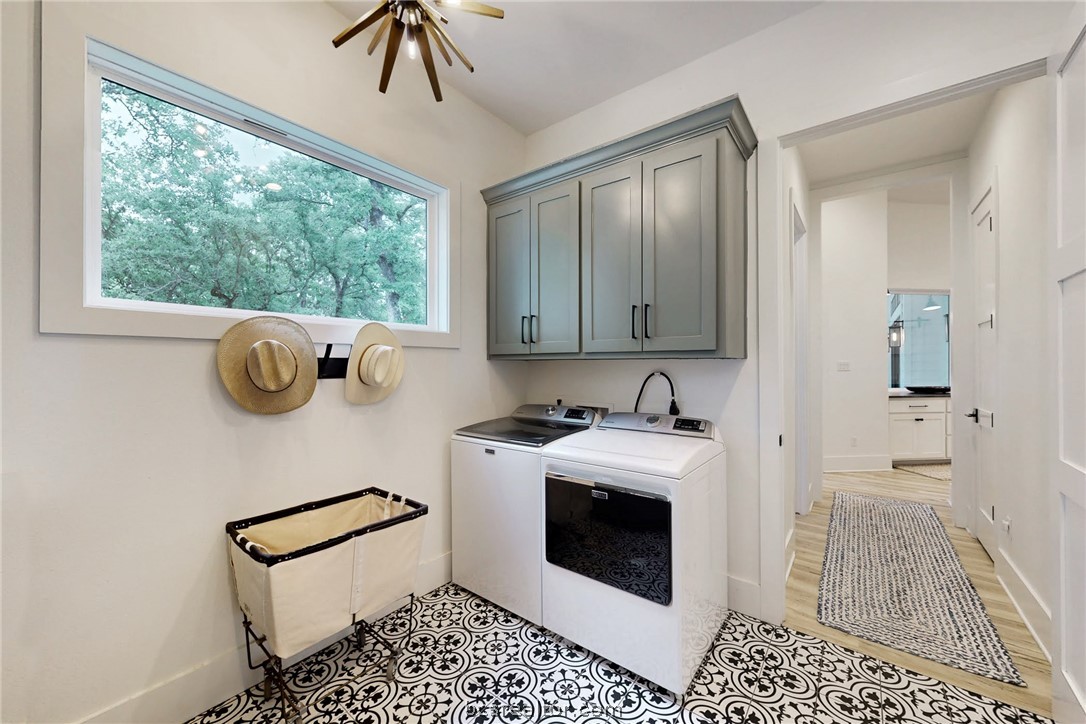 1629 Sawmill Road Franklin, TX 77856 - Photo 17 of 47 a kitchen with a stove a sink and a window