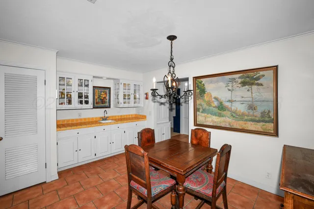 a view of a living room and dining room
