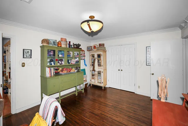 a room with furniture and a window