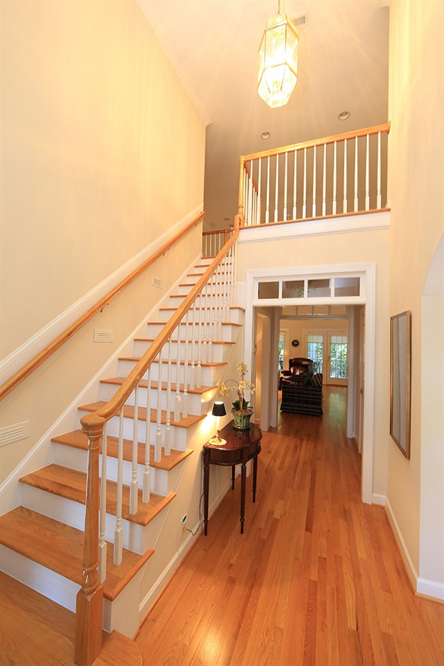 2516 Wertherson Lane Raleigh, NC 27613 - Photo 4 of 25 Two story entry foyer. Hardwood treads on stairs to second floor. Entry