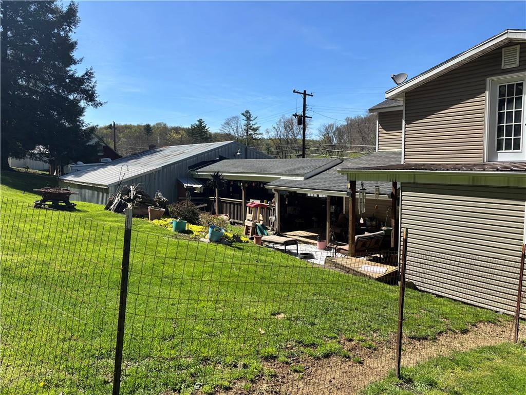 13008 Highway 286 Commodore, PA 15729 - Photo 20 of 23 a view of a chair and tables in the patio