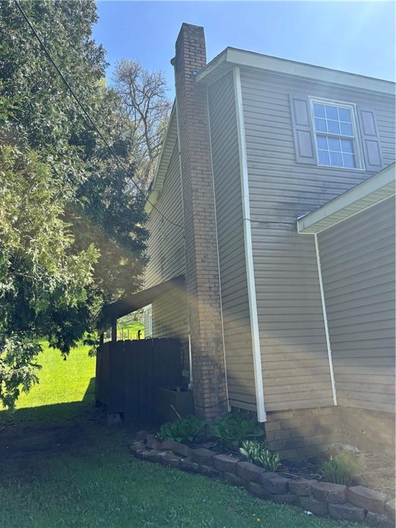 13008 Highway 286 Commodore, PA 15729 - Photo 22 of 23 front view of a house with a yard