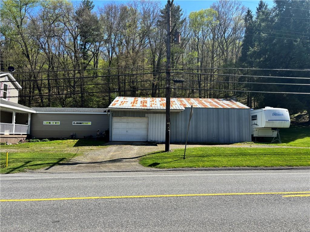 13008 Highway 286 Commodore, PA 15729 - Photo 23 of 23 a backyard of a house with lots of green space