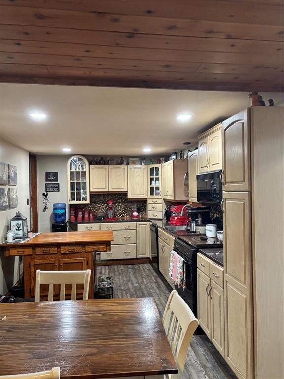 13008 Highway 286 Commodore, PA 15729 - Photo 5 of 23 a kitchen with stainless steel appliances granite countertop a stove and cabinets