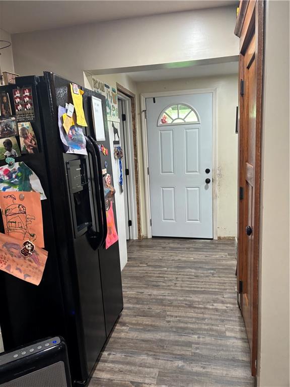 13008 Highway 286 Commodore, PA 15729 - Photo 8 of 23 a view of a entryway door with wooden floor