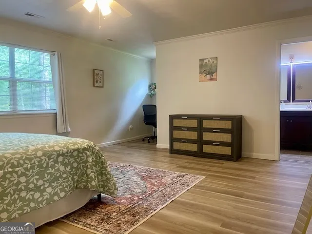 a bedroom with a bed and a cabinets