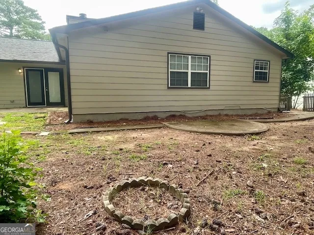 a view of a backyard of a house