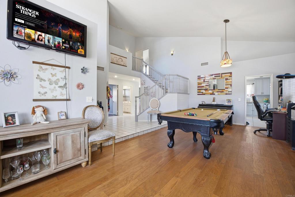 2077 Westwood Road Vista, CA 92083 - Photo 10 of 37 a living room with furniture and a table
