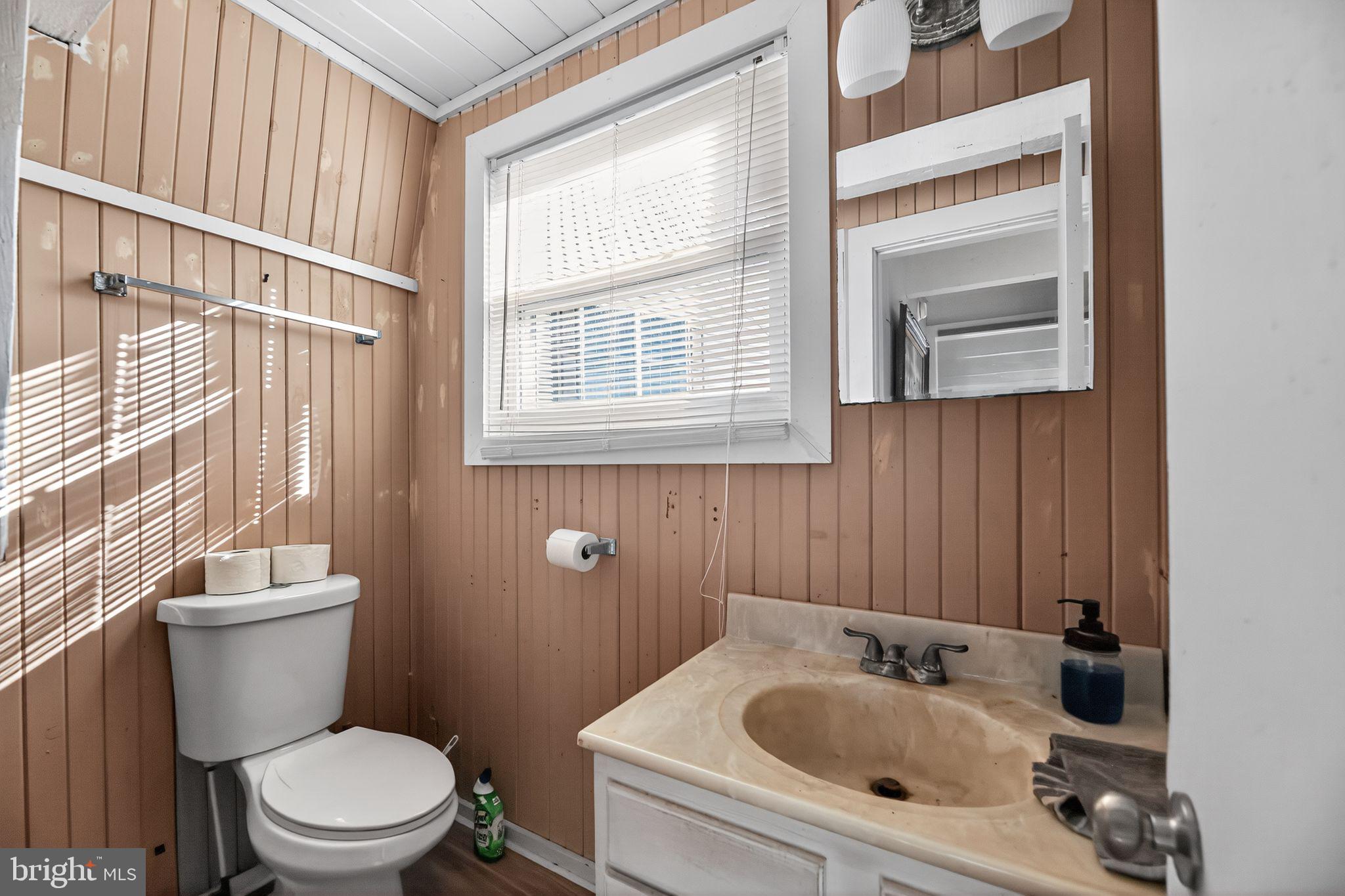 92 Sinnickson Landing Road Salem, NJ 08079 - Photo 11 of 39 a white toilet sitting next to a bathroom sink