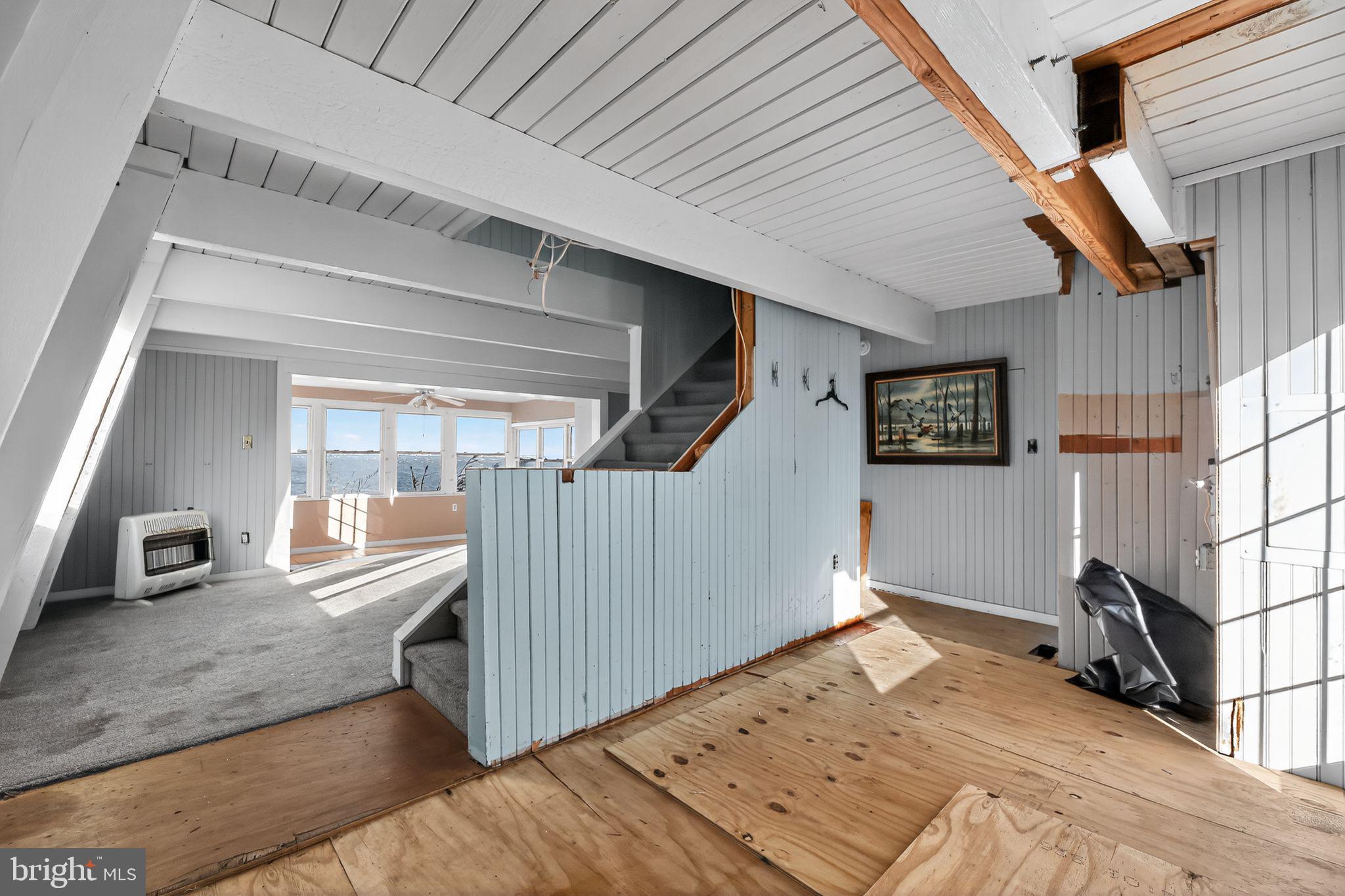 92 Sinnickson Landing Road Salem, NJ 08079 - Photo 2 of 39 a view of a hallway to a house with wooden floor and stairs