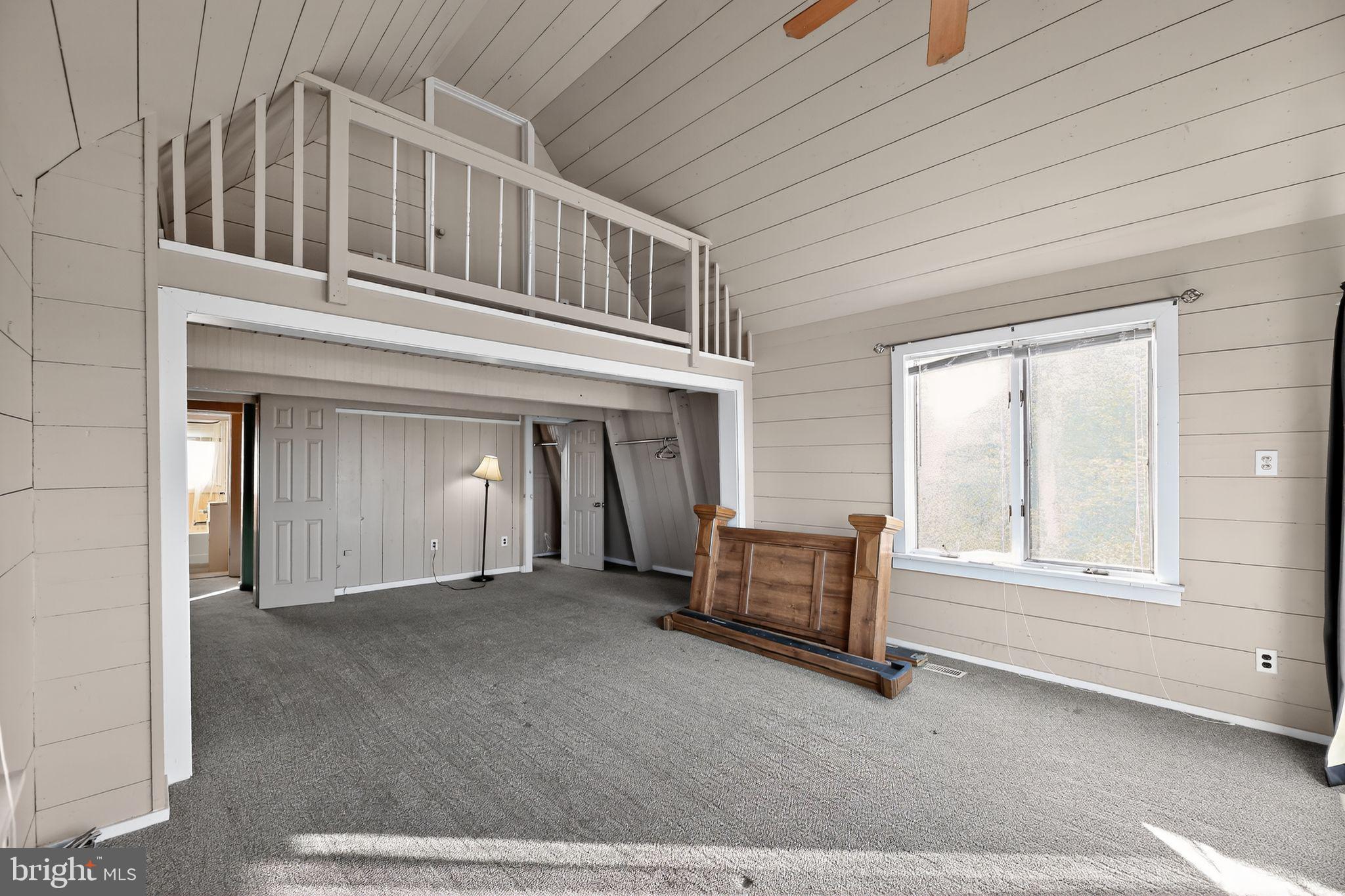 92 Sinnickson Landing Road Salem, NJ 08079 - Photo 3 of 39 a view of an empty room with wooden floor and a window