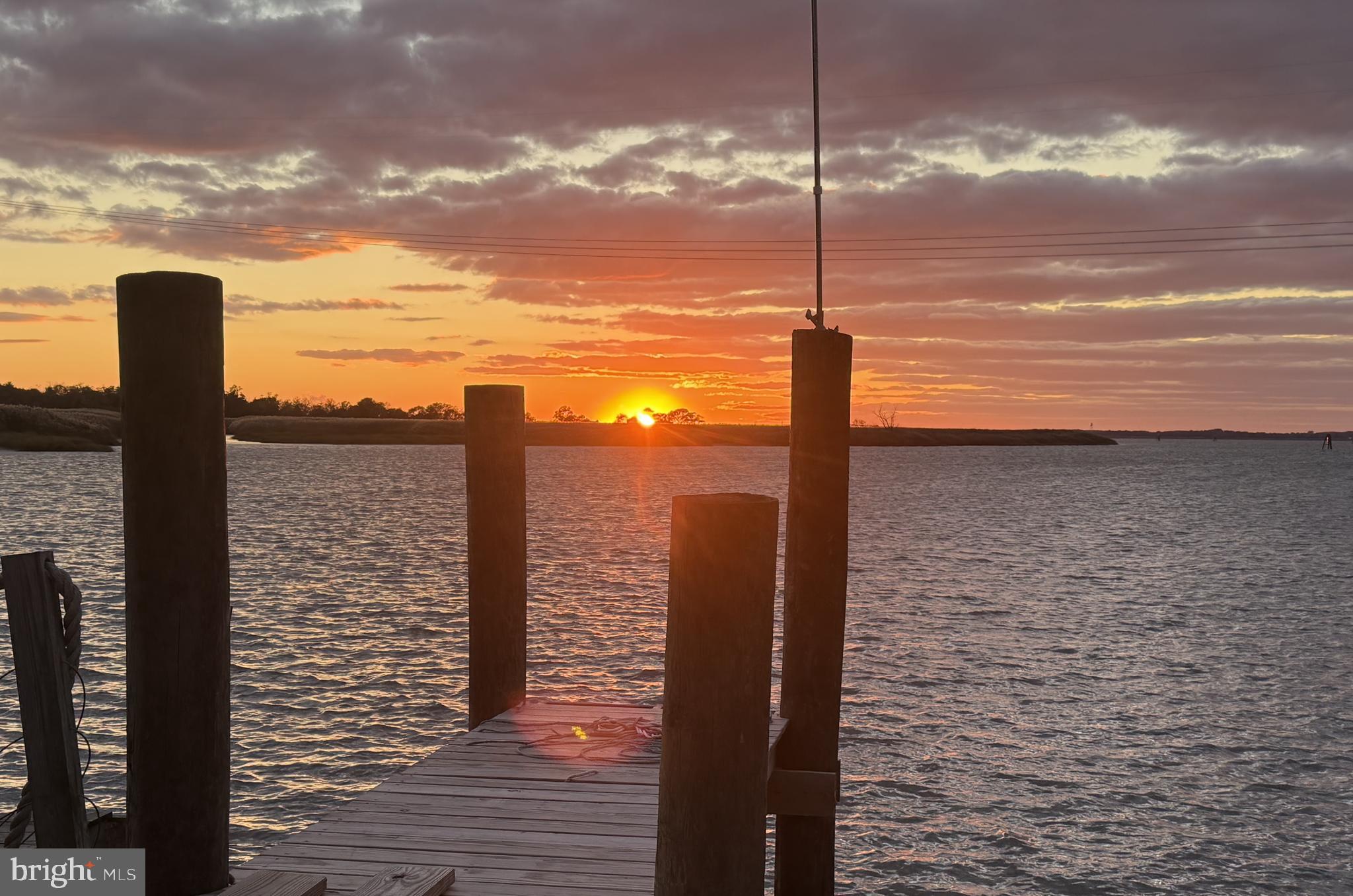 92 Sinnickson Landing Road Salem, NJ 08079 - Photo 38 of 39 a street sign on a pier next to a building