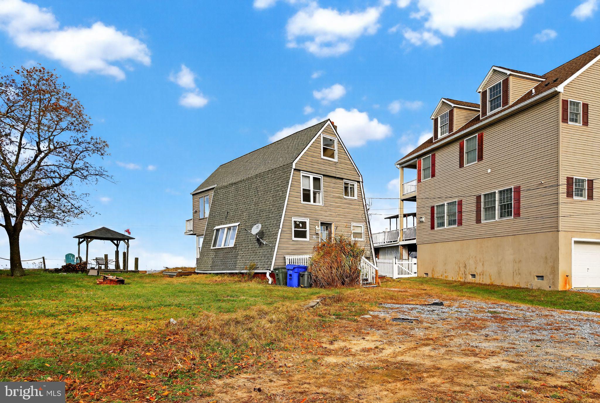 92 Sinnickson Landing Road Salem, NJ 08079 - Photo 5 of 36 a front view of a house with a yard