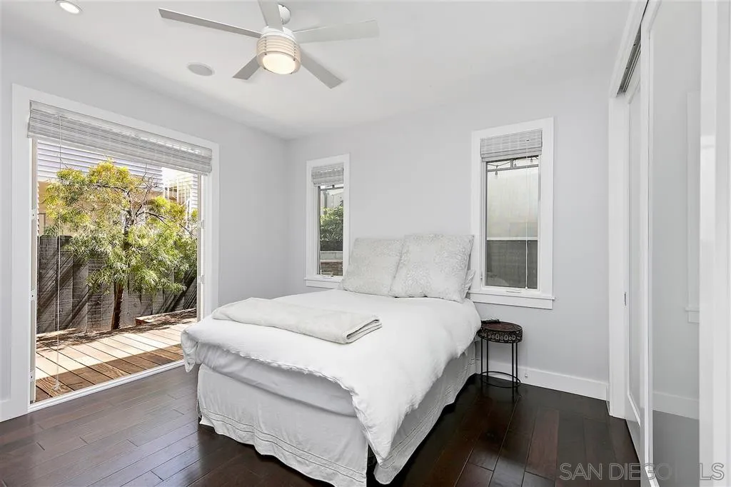 139 27th Street Del Mar, CA 92014 - Photo 13 of 25 a bed sitting in a bedroom next to a window
