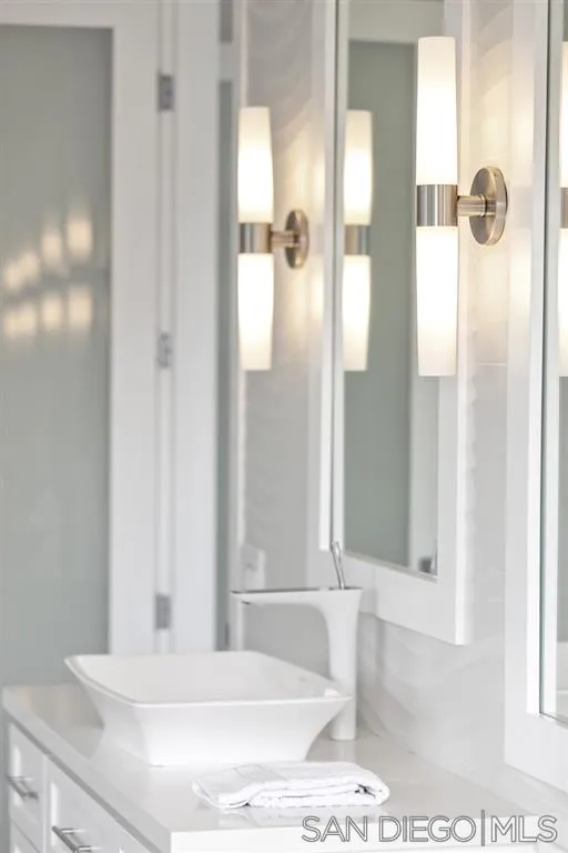 139 27th Street Del Mar, CA 92014 - Photo 21 of 25 a bathroom with a bathtub and a shower