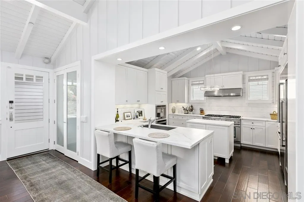 139 27th Street Del Mar, CA 92014 - Photo 5 of 25 a kitchen with stainless steel appliances a stove a sink dishwasher and a refrigerator