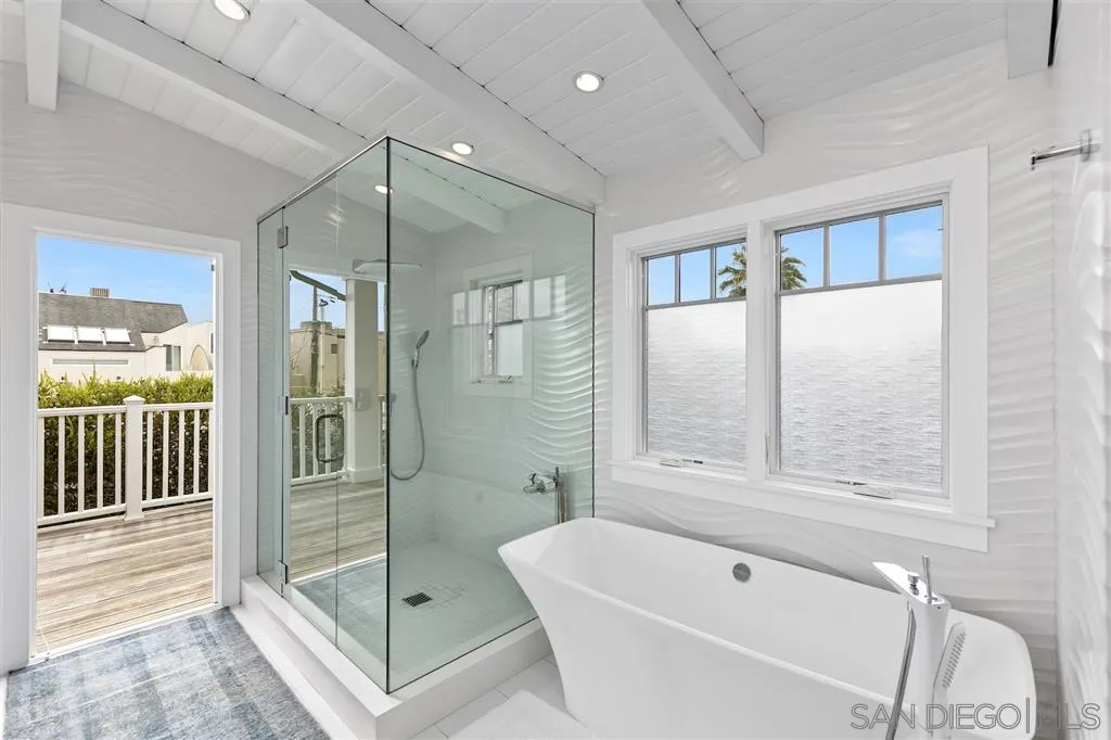139 27th Street Del Mar, CA 92014 - Photo 10 of 25 a bathroom with a tub and shower