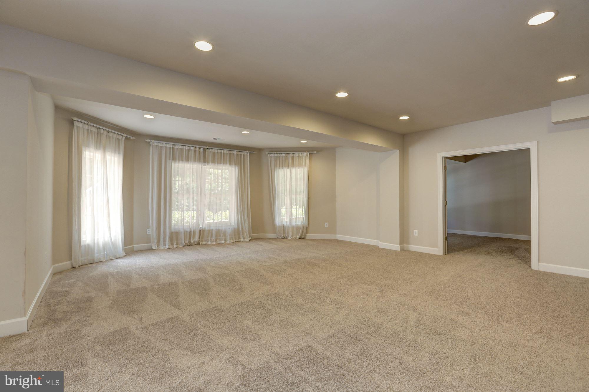 23118 Persimmon Ridge Road Clarksburg, MD 20871 - Photo 26 of 30 Daylight Lower Family Room