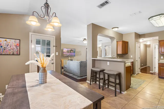 a view of a dining room with furniture