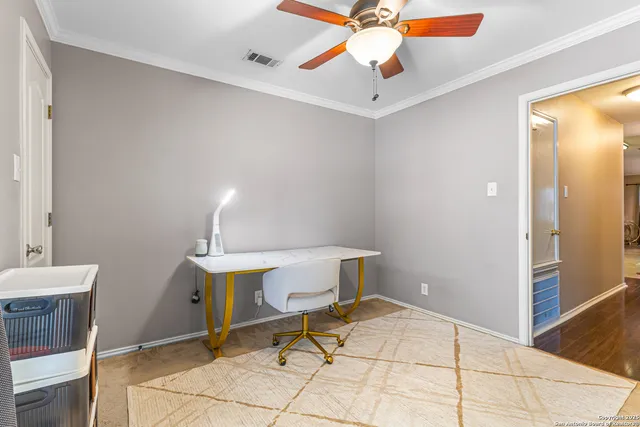 a view of a workspace with furniture