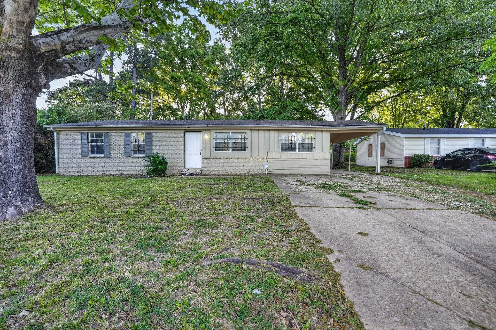 4504 Neely Road Memphis, TN 38109 - Photo 4 of 32 front view of house with a yard