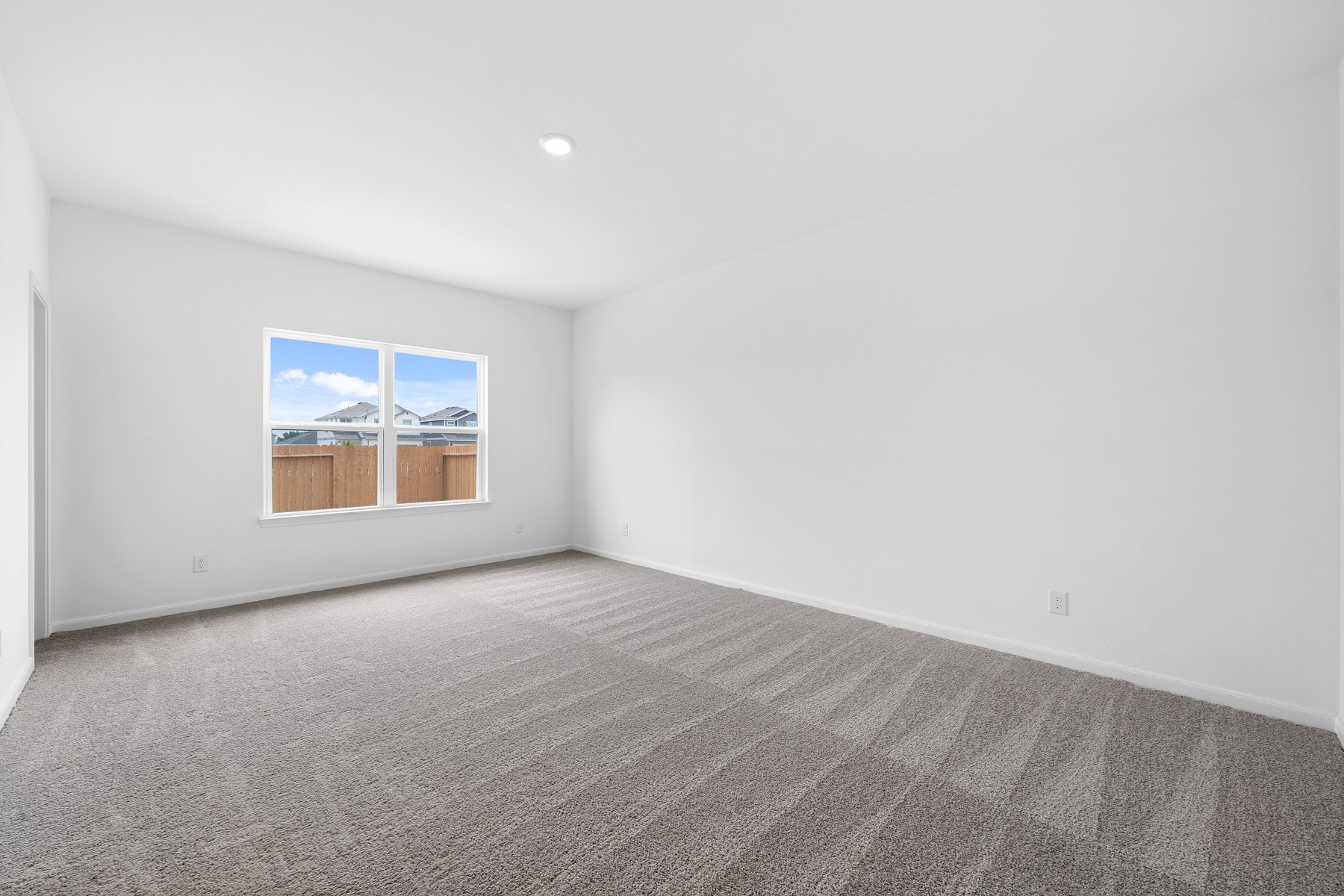 368 Low Pasture Trail Maxwell, TX 78656 - Photo 4 of 13 an empty room with windows