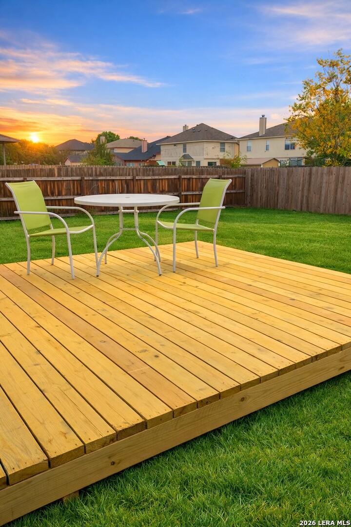 9818 Copper Elm Converse, TX 78109 - Photo 11 of 11 a view of a backyard with a garden