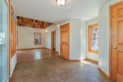 a view of a livingroom with a staircase