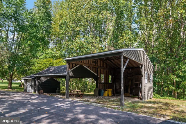 a view of wooden house with a trees