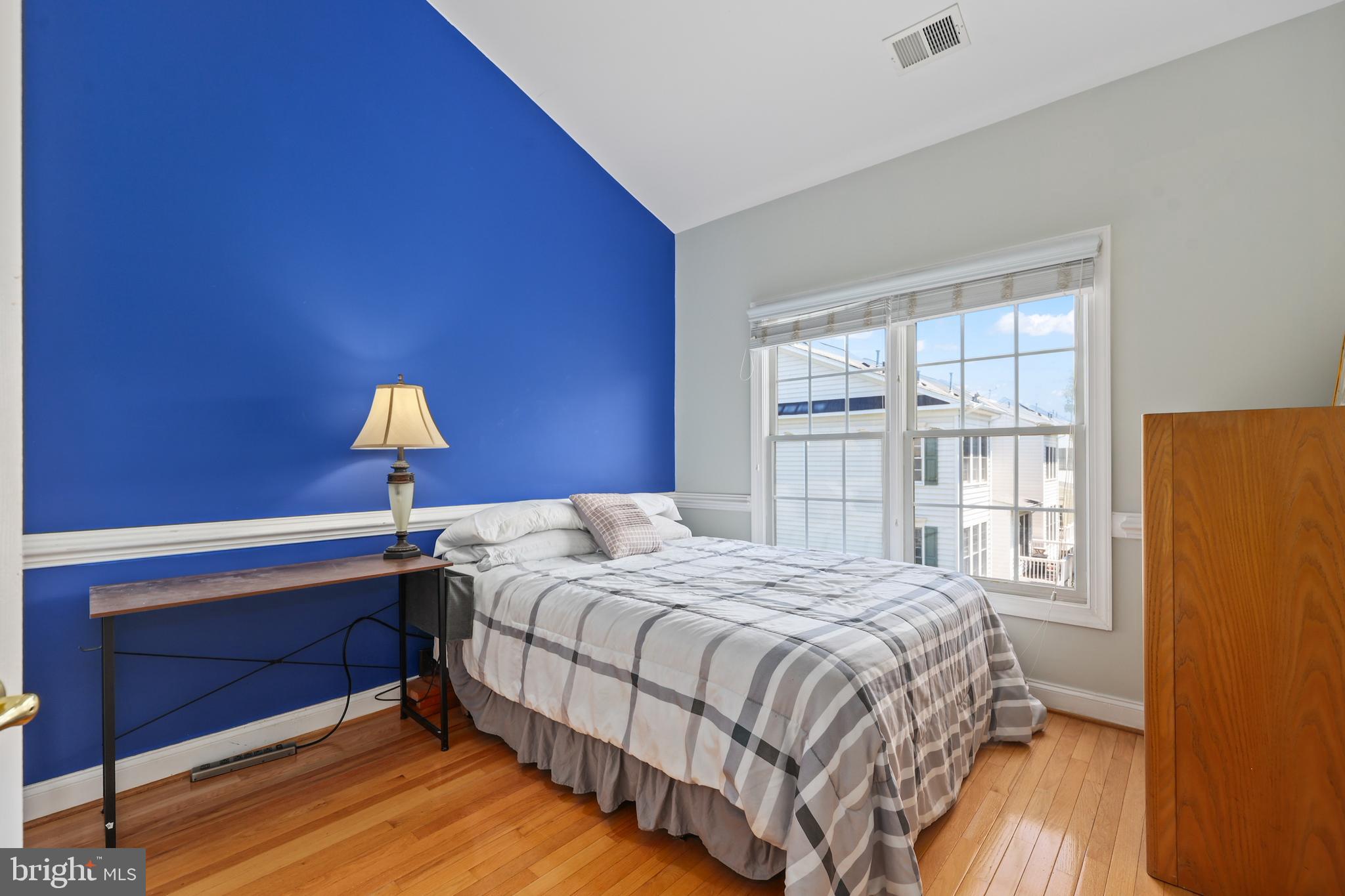 6806 Witton Circle Gainesville, VA 20155 - Photo 21 of 47 a bedroom with a bed and a window