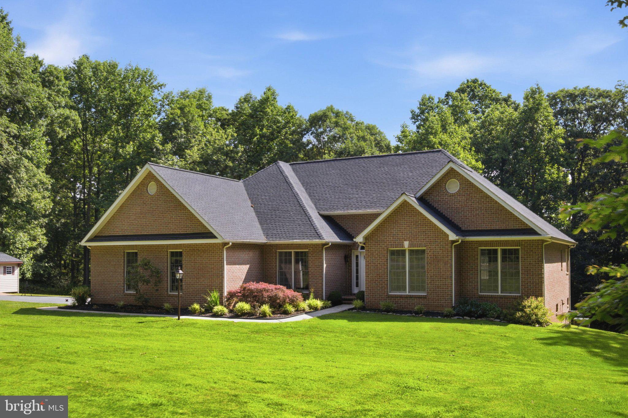Custom built Rancher w/ Pool on 3+private acres