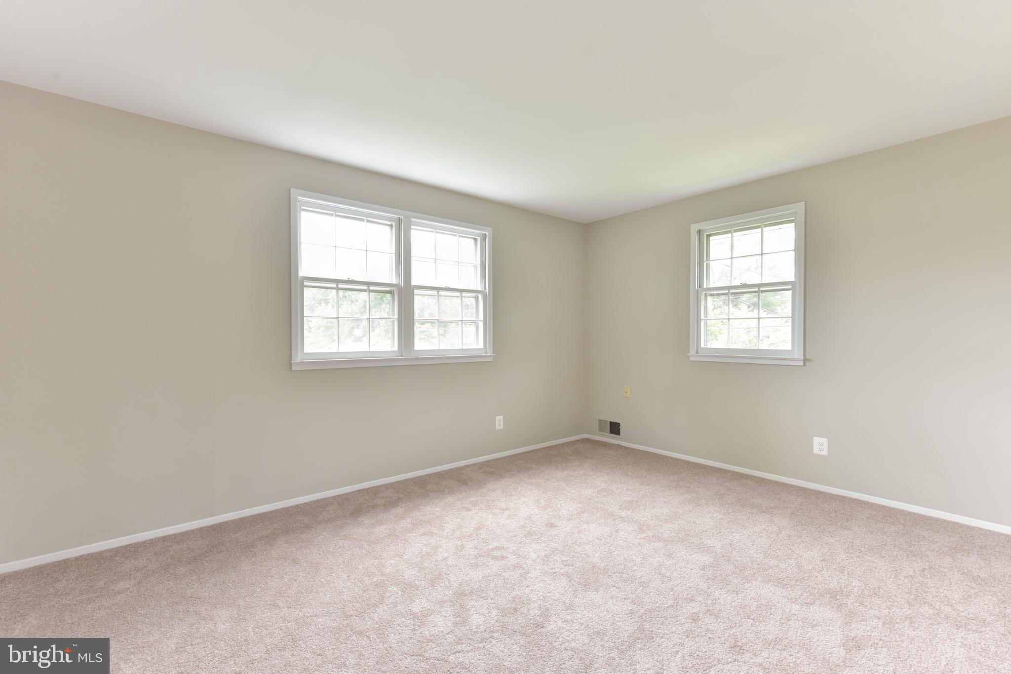8021 Ellet Road Springfield, VA 22151 - Photo 21 of 53 an empty room with windows