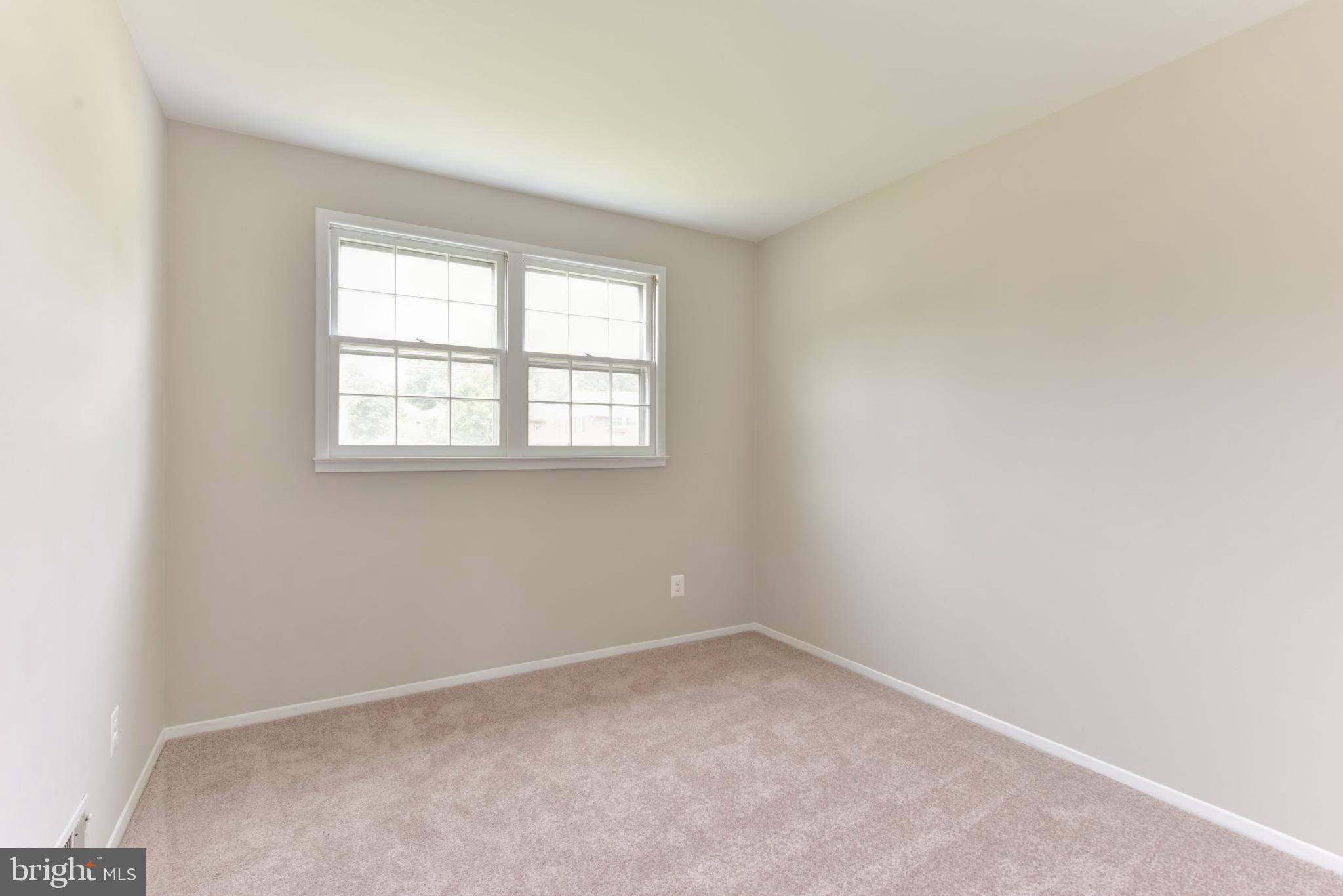 8021 Ellet Road Springfield, VA 22151 - Photo 23 of 53 an empty room with a window