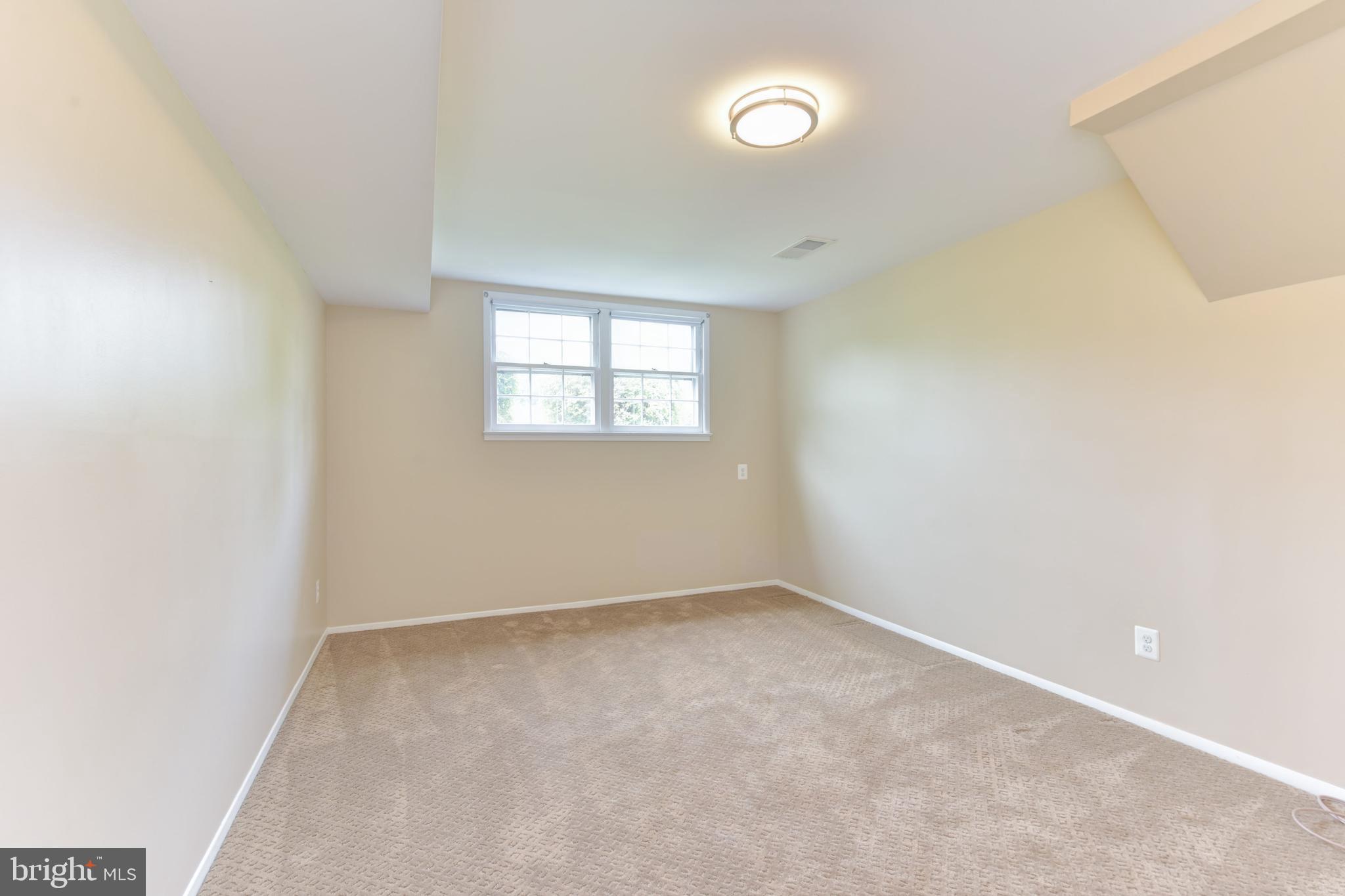 8021 Ellet Road Springfield, VA 22151 - Photo 25 of 53 an empty room with windows