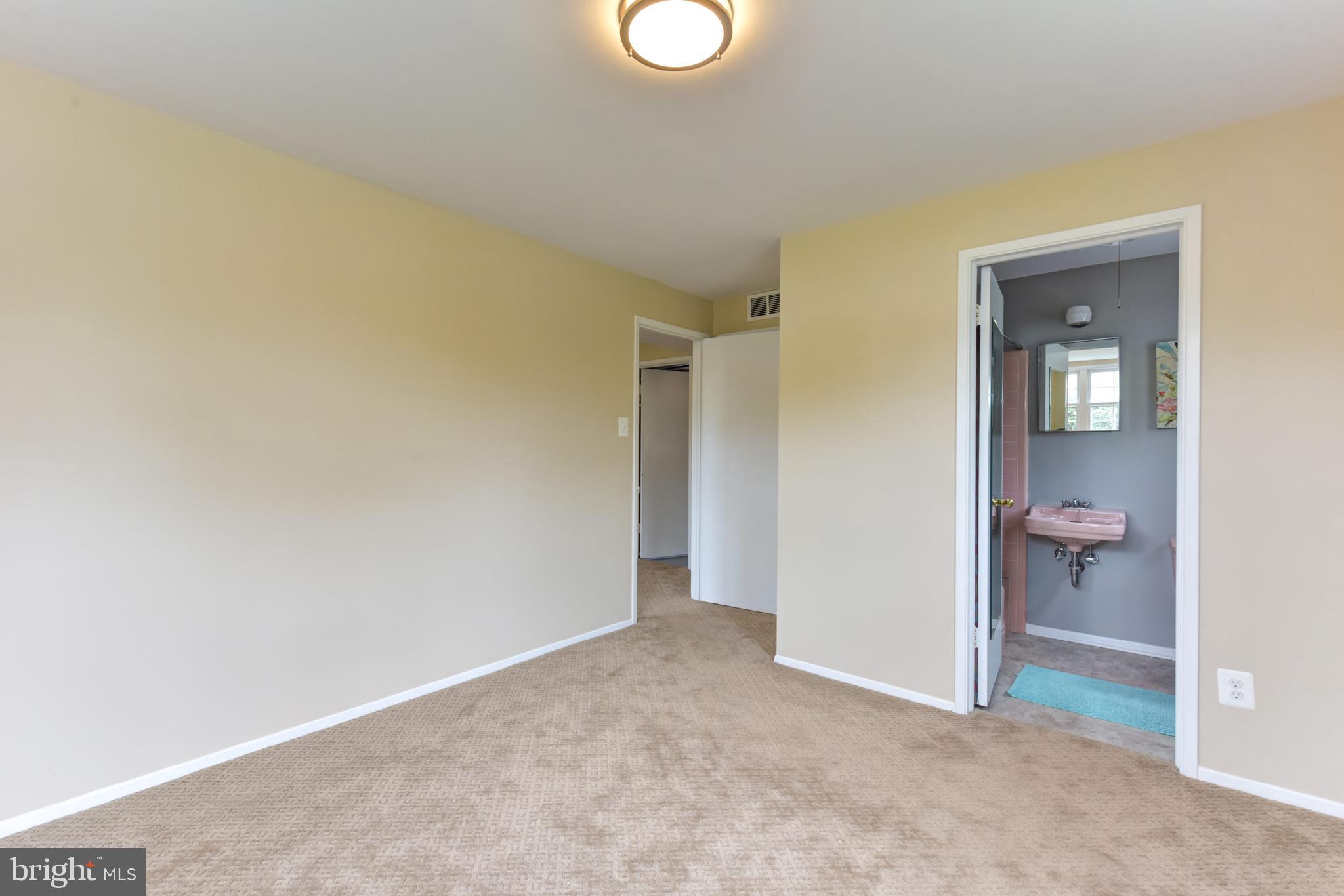 8021 Ellet Road Springfield, VA 22151 - Photo 26 of 53 a view of an empty room and window