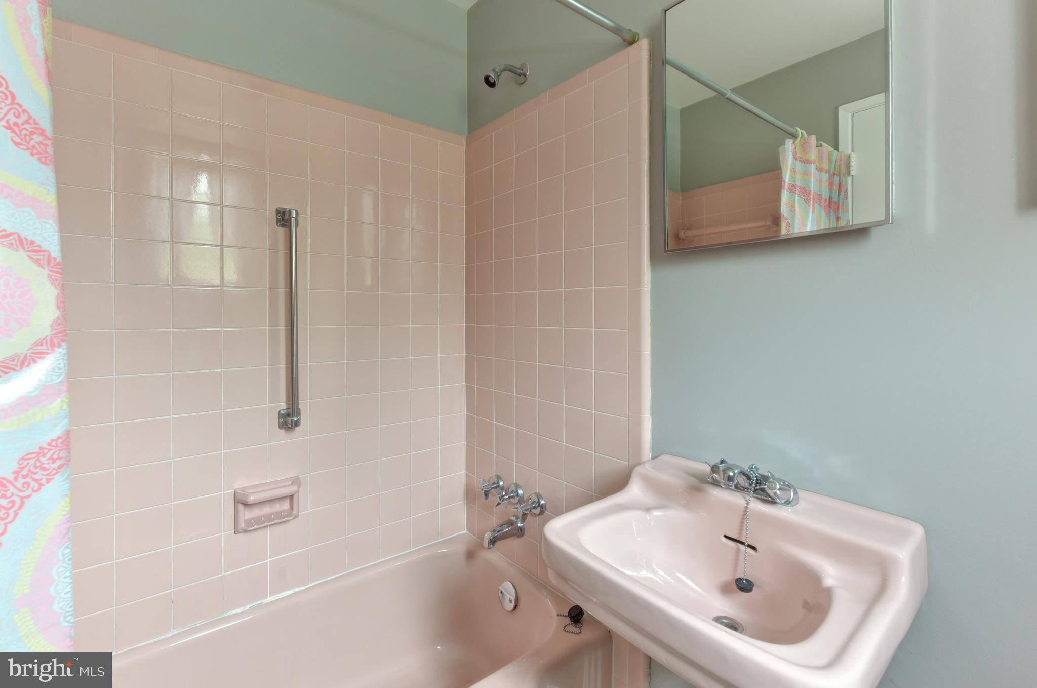 8021 Ellet Road Springfield, VA 22151 - Photo 27 of 53 a bathroom with a sink a toilet and shower