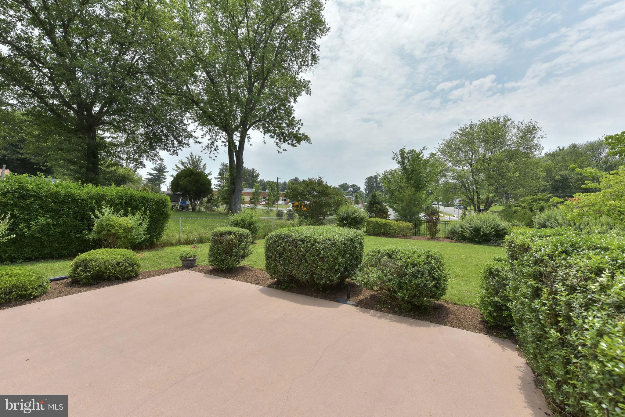 8021 Ellet Road Springfield, VA 22151 - Photo 39 of 53 a view of a road with a big yard