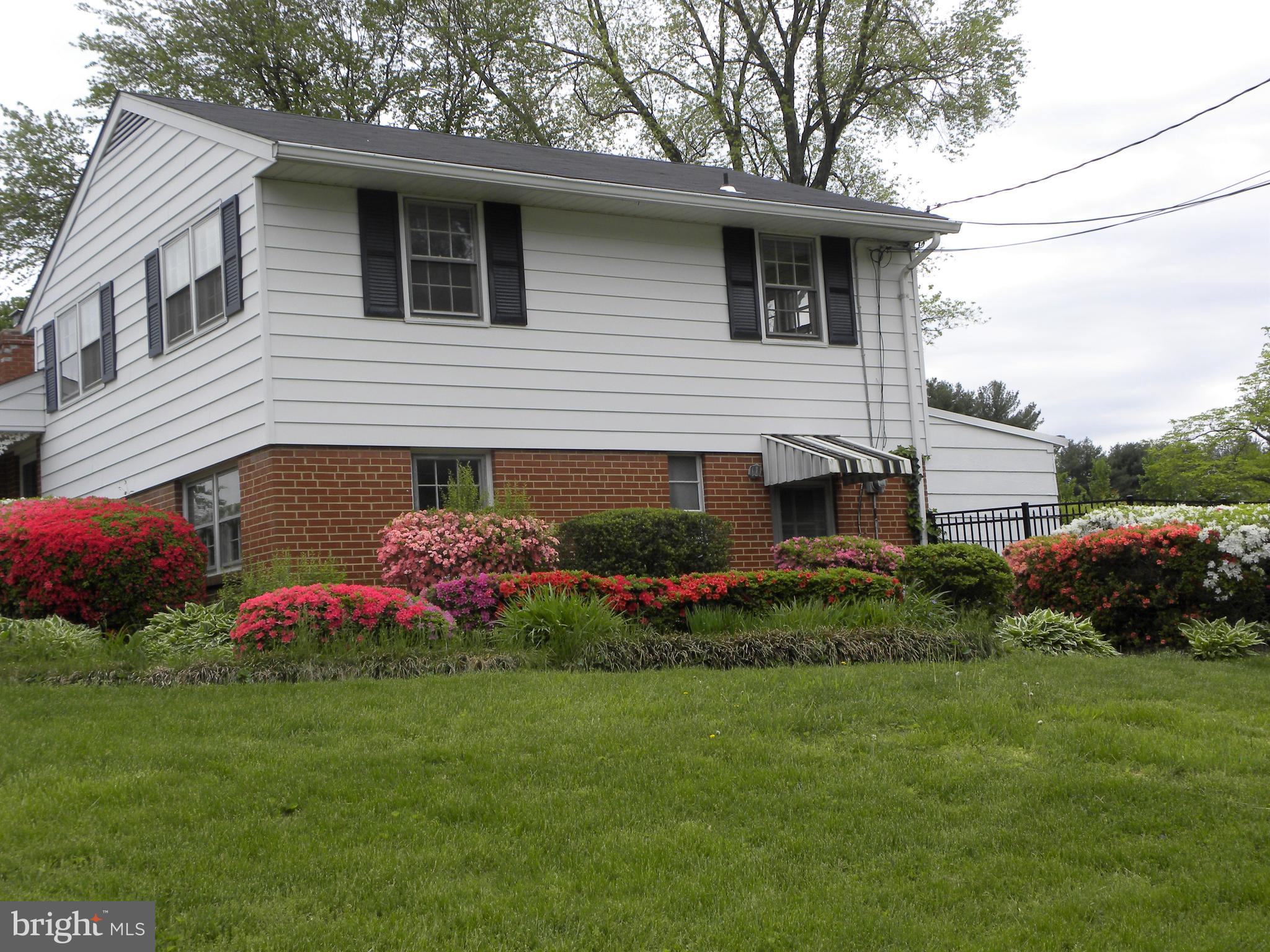 8021 Ellet Road Springfield, VA 22151 - Photo 44 of 53 a view of a house with a garden