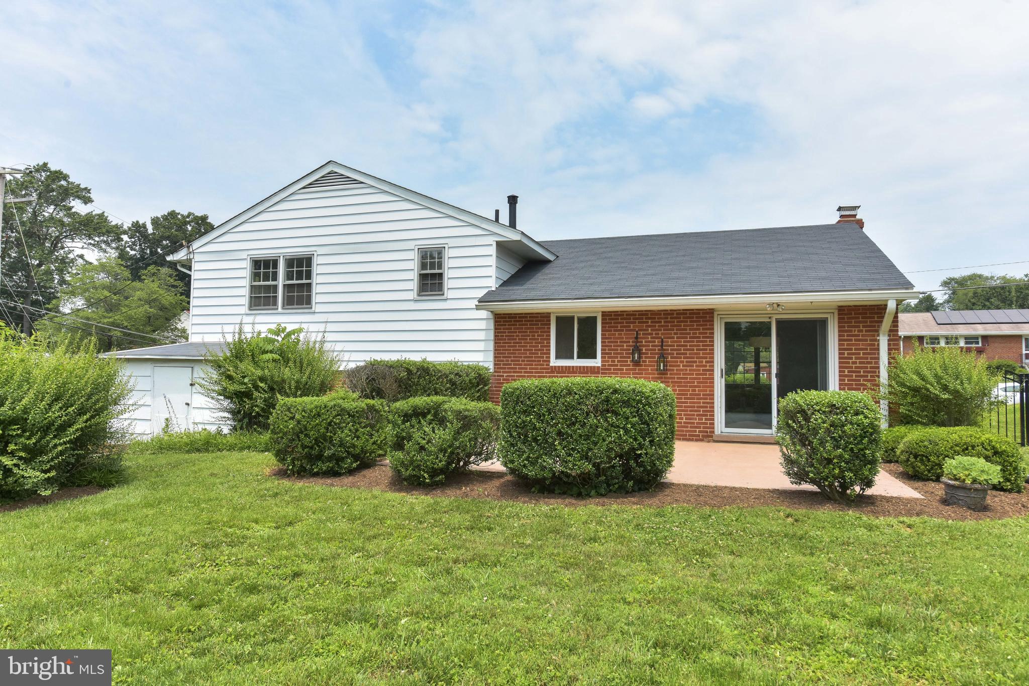8021 Ellet Road Springfield, VA 22151 - Photo 46 of 53 a front view of house with yard and green space